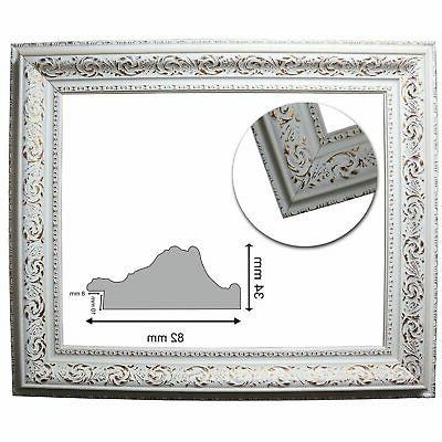 cornice barocca bianca con ornamento oro 566