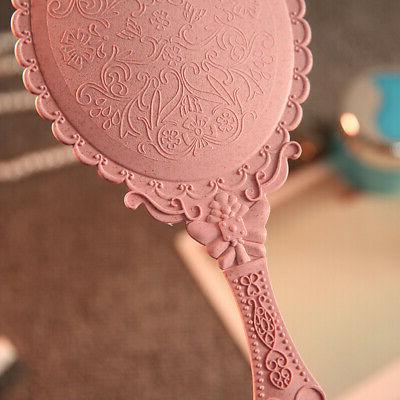 donna vintage a sbalzo floreale mano held