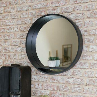 grande rotondo nero mirroring muro scaffale scaffalatura