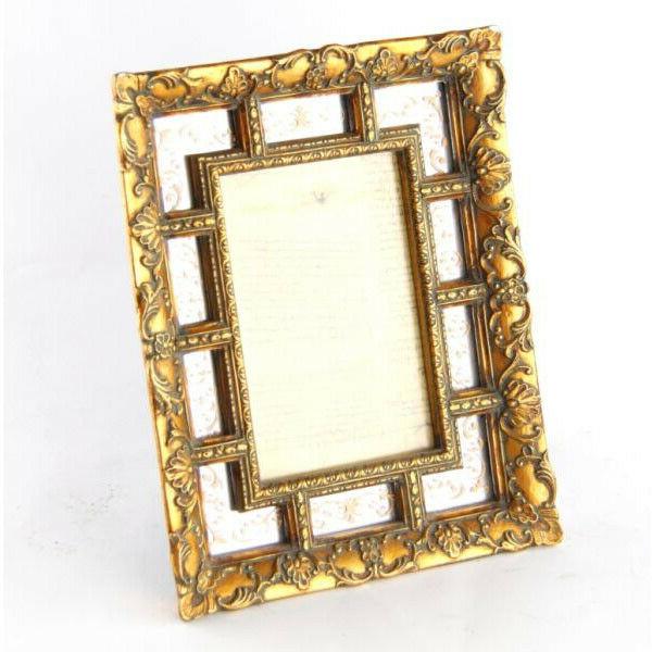 portafoto in oro anticato stile liberty con