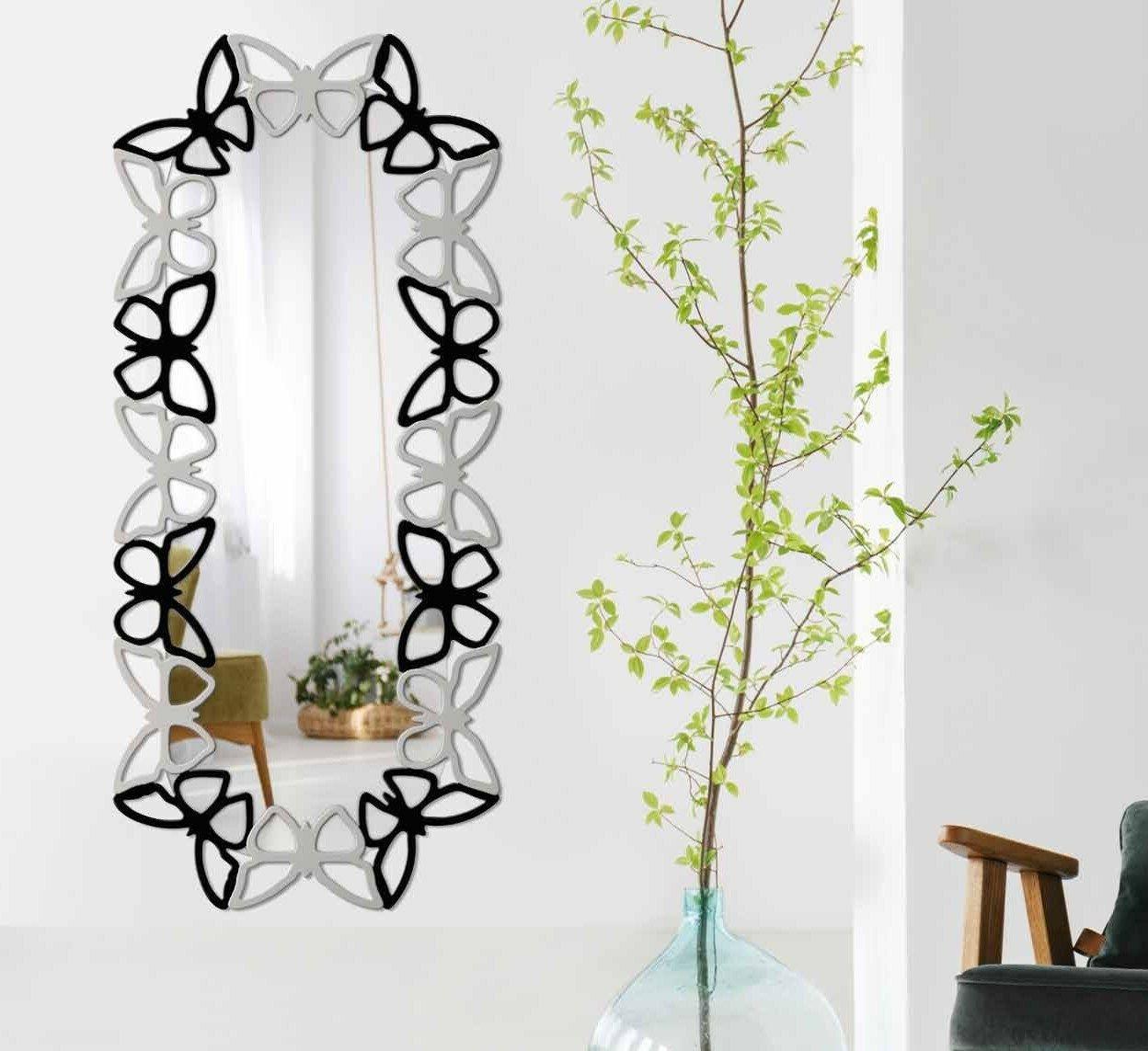 specchiera ermes con cornice traforata elementi laccati