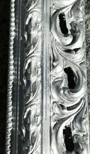 specchiera moderna traforata foglia argento arredo sala