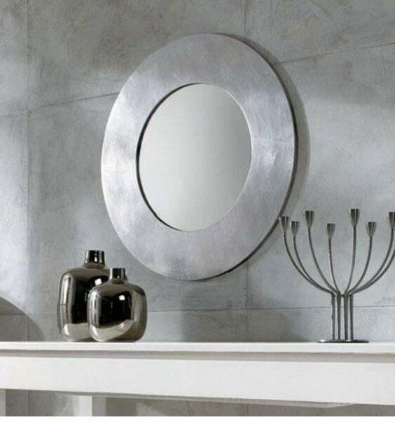 specchiera rotonda moderna con cornice foglia argento