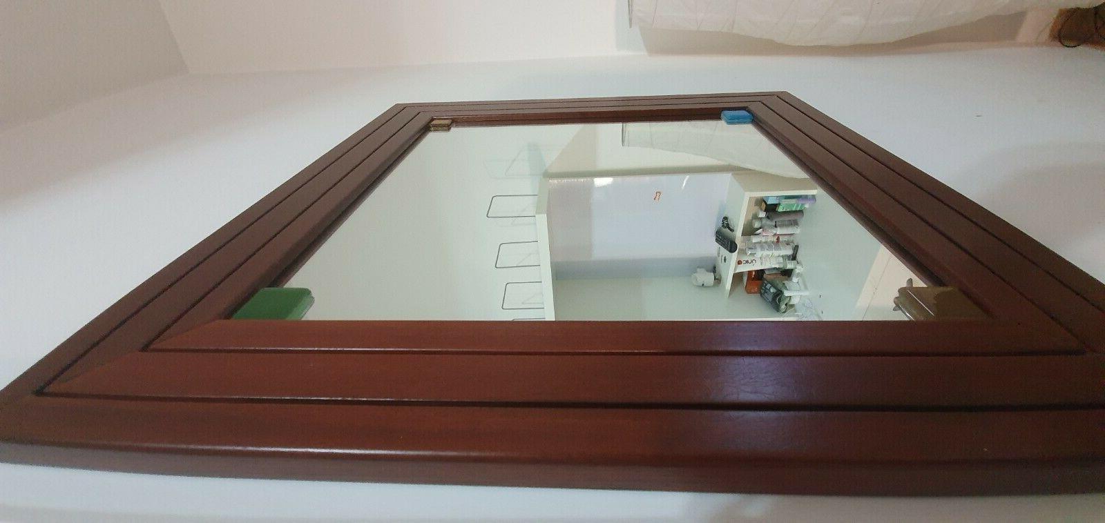 specchio con cornice in legno