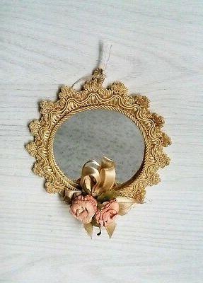 specchio da parete in tessuto con fiorellini