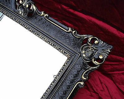 specchio in stile barocco muro nero oro