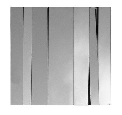 specchio moderno da parete astratto in rilievo